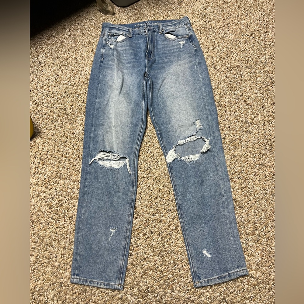 women’s blue ripped jeans